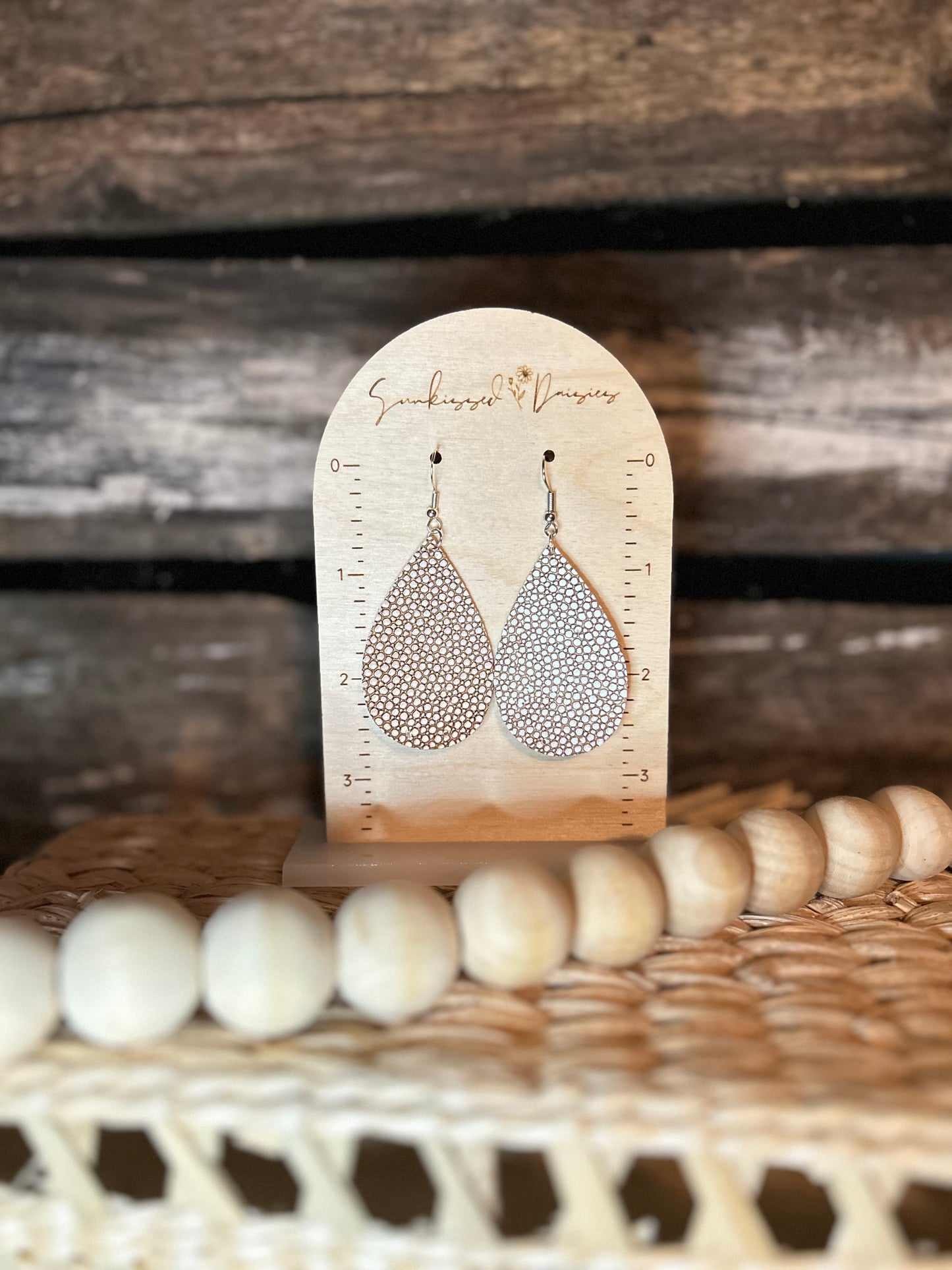 Burgundy speckled tear drop earring