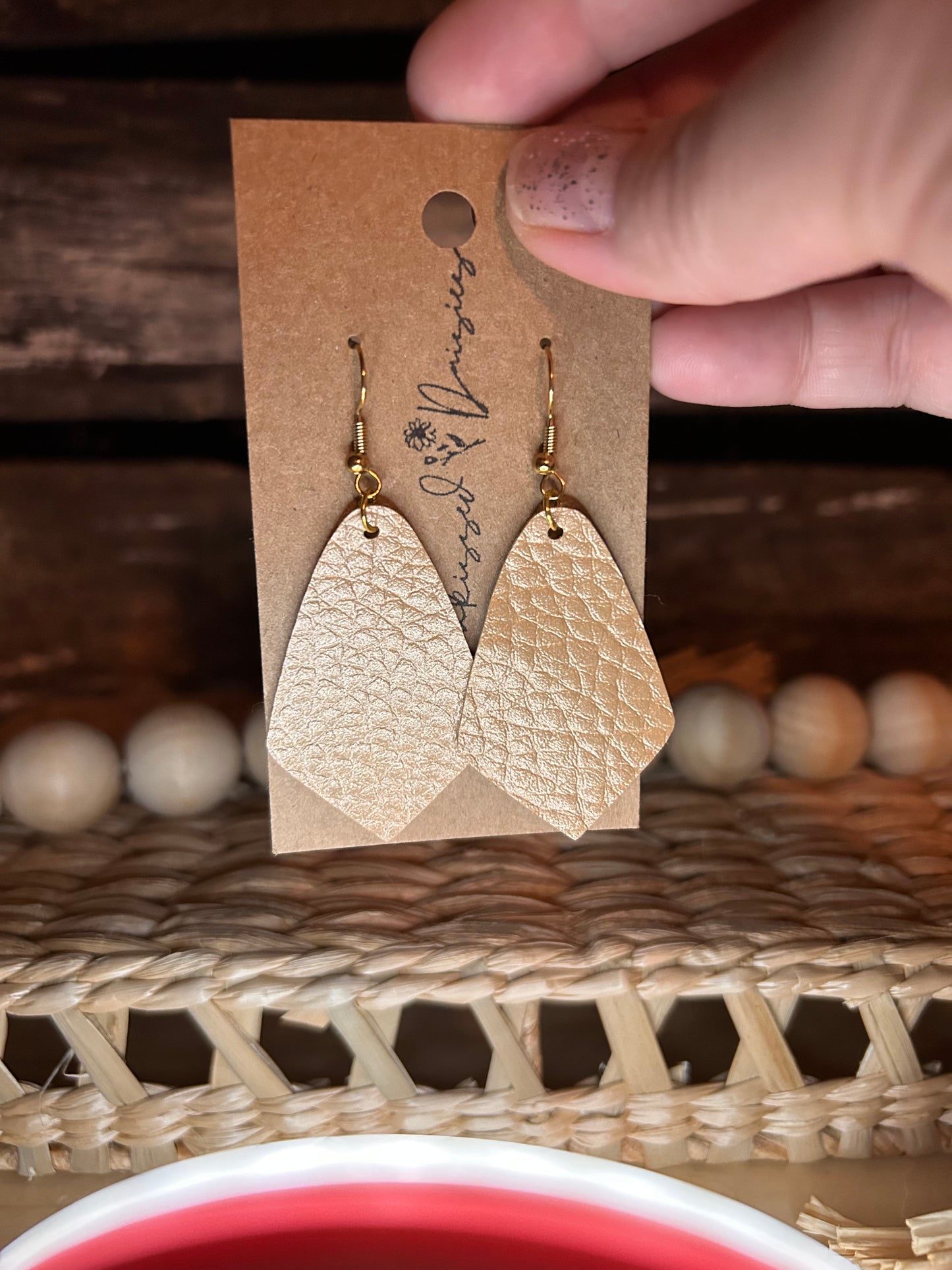 Gold faux leather earring