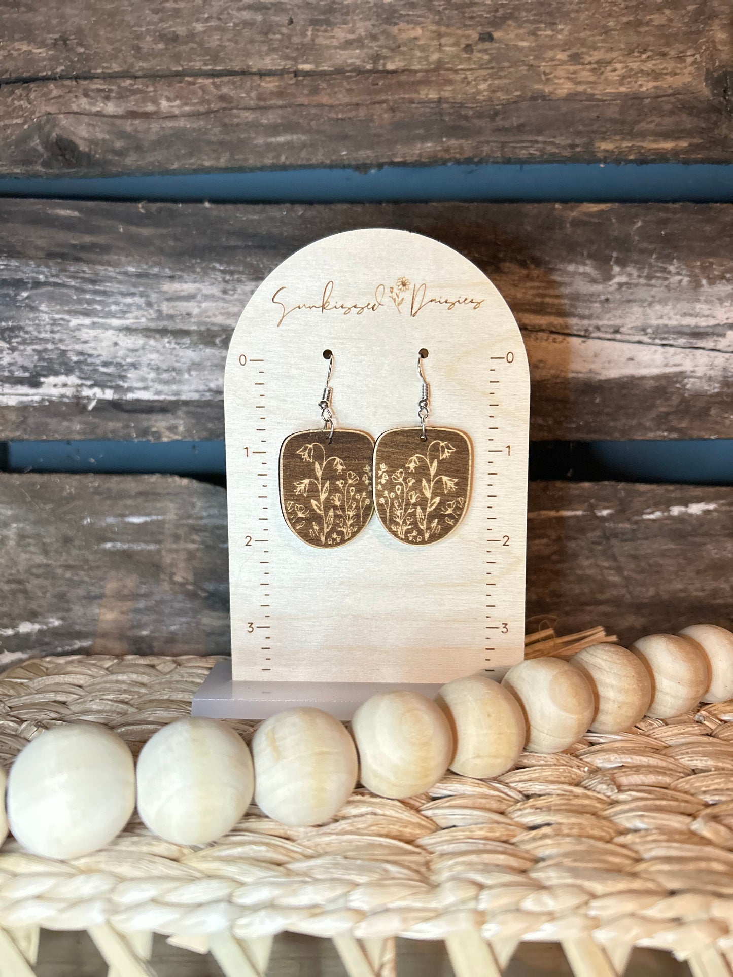 Negative floral engraved earring