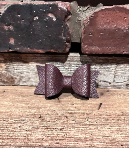 Dark purple faux leather bow